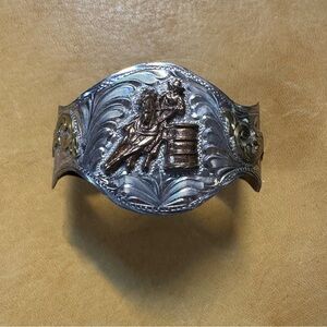 Barrel racer, sterling silver Bracelet with floral detailing on sides bracelet.